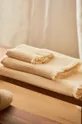 Veľký bavlnený uterák Calma House Marte 90x150 cm béžová