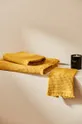 Μεσαία βαμβακερή πετσέτα Calma House Marte 50x100 cm κίτρινο
