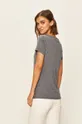 Tommy Jeans - T-shirt <p> 
44% pamut, 50% poliészter, 6% viszkóz</p>