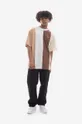 Βαμβακερό μπλουζάκι Karl Kani Chest Signature OS Striped Tee  100% Βαμβάκι
