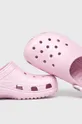 pastel pink Crocs sliders