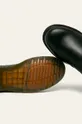 black Dr. Martens leather chelsea boots