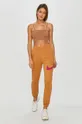 Nike Sportswear - Штани помаранчевий