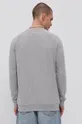 adidas Originals bombažni pulover  Osnovni material: 100% Bombaž Rebranje: 95% Bombaž, 5% Elastane