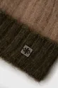 Kapa s dodatkom vune Granadilla Dujardin  Postava: 100% Poliester Temeljni materijal: 42% Akril, 14% Moher, 30% Poliamid, 14% Vuna