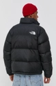 The North Face pehelydzseki  Bélés: 100% nejlon Kitöltés: 90% pehely, 10% pehely Jelentős anyag: 100% nejlon