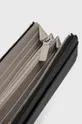 Peňaženka Lacoste  Základná látka: 100% PVC Vnútro: 83% Polyester, 17% Bavlna