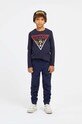 Guess Spodnie dziecięce dzianina granatowy L93Q24.KAUG0