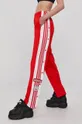 Nohavice adidas Originals H34672 červená