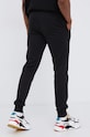 Odzież Puma spodnie 586748 czarny