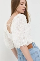 Bluza For Love & Lemons  Temeljni materijal: 55% Bambus, 45% Modal Postava: 98% Reciklirani poliester, 2% Elastan