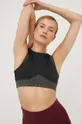 Reebok sportmelltartó jógázáshoz Studio Layered Női