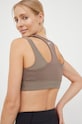 Одежда Бюстгальтер для йоги Reebok Studio Layered HM5768 коричневый