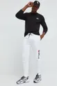 Bombažna majica z dolgimi rokavi Tommy Jeans črna