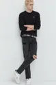 Βαμβακερή μπλούζα με μακριά μανίκια Tommy Jeans μαύρο