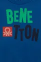 Otroška bombažna trenirka United Colors of Benetton  Glavni material: 100% Bombaž Vstavki: 95% Bombaž, 5% Elastan