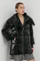 Куртка Guess Mathilde  Основной материал: 100% Полиамид Подкладка: 96% Полиэстер, 4% Эластан Наполнитель: 100% Полиэстер Покрытие: 100% Полиуретан