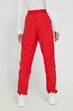 Odzież Fila spodnie dresowe FAW0263 czerwony