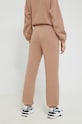 Odzież Champion spodnie dresowe 115668 beżowy