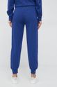 Спортен панталон United Colors of Benetton  Основен материал: 55% Полиестер, 45% Памук Допълнителни елементи: 100% Вискоза Кант: 95% Памук, 5% Еластан