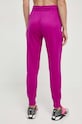Odzież Under Armour spodnie dresowe Armour Fleece 1373054 różowy