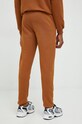 Odzież Fila spodnie dresowe FAM0160 brązowy