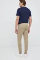 Lacoste pantaloni de trening  Materialul de baza: 84% Bumbac, 16% Poliester  Banda elastica: 99% Bumbac, 1% Elastan