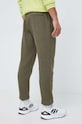 Odzież Under Armour spodnie dresowe 1373882 zielony