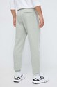 Odzież Under Armour spodnie dresowe 1373882 zielony