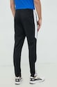 Odzież Under Armour spodnie treningowe Tricot 1373792 czarny