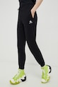 Odzież Converse spodnie dresowe 10023873.A01 czarny