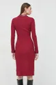 Φόρεμα Guess Yasmine  Υλικό 1: 94% Βισκόζη, 6% Σπαντέξ Υλικό 2: 100% Πολυεστέρας Κάλυμμα: 100% Poliuretan