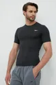Tréningové tričko Reebok Workout Ready  1. látka: 84% Recyklovaný polyester, 16% Elastan 2. látka: 89% Recyklovaný polyester, 11% Elastan