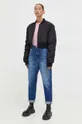 Βαμβακερή μπλούζα με μακριά μανίκια Tommy Jeans ροζ