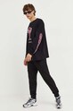 Bavlnené tričko s dlhým rukávom GCDS FW23M110189 čierna AW23