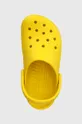 yellow Crocs sliders