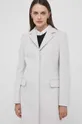 Vlnený kabát Calvin Klein Základná látka: 75 % Vlna, 20 % Polyamid, 5 % Kašmír Podšívka: 100 % Viskóza