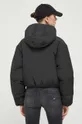 Pernata jakna Tommy Jeans  Temeljni materijal: 100% Poliester Postava: 100% Poliester Ispuna: 90% Pačje paperje, 10% Pačje perje