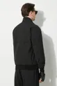 Куртка-бомбер Baracuta G9 Cloth Основной материал: 56% Полиэстер, 44% Хлопок Подкладка 1: 80% Хлопок, 20% Полиэстер Подкладка 2: 100% Полиэстер