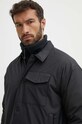 The North Face giacca Stuffed Coaches nero NF0A8322KX71