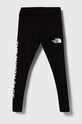 The North Face legginsy dziecięce GRAPHIC LEGGINGS z elastanem czarny NF0A82EQ
