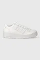 white adidas Originals leather sneakers Women’s