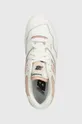 white New Balance leather sneakers 550