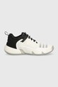 Παιδικά αθλητικά παπούτσια adidas Originals TRAE UNLIMITED J απομίμηση λείου δέρματος λευκό IG0704