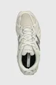 white New Balance sneakers ML610TBA