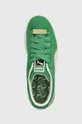 green Puma suede sneakers