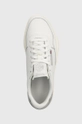 white Reebok leather sneakers