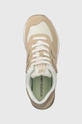 beige New Balance sneakers 574