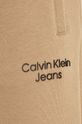 Calvin Klein Jeans spodnie dresowe dziecięce beżowy IB0IB01282.9BYX