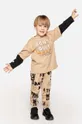 бежевий Дитячі бавовняні штани Coccodrillo Для хлопчиків